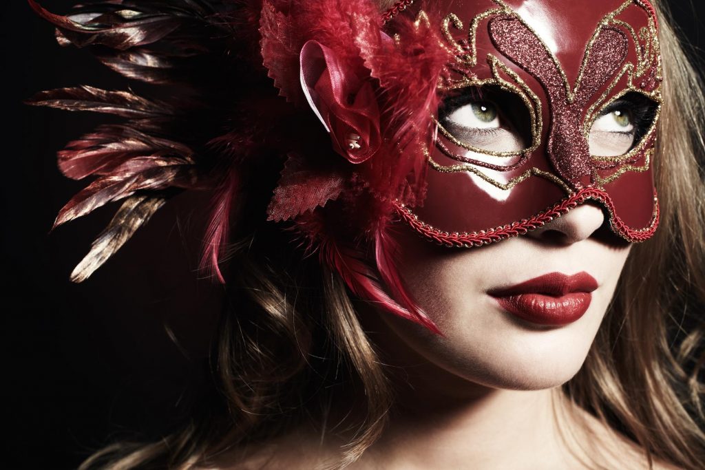 beautiful-young-woman-in-a-red-mysterious-venetian-2023-11-27-05-03-55-utc