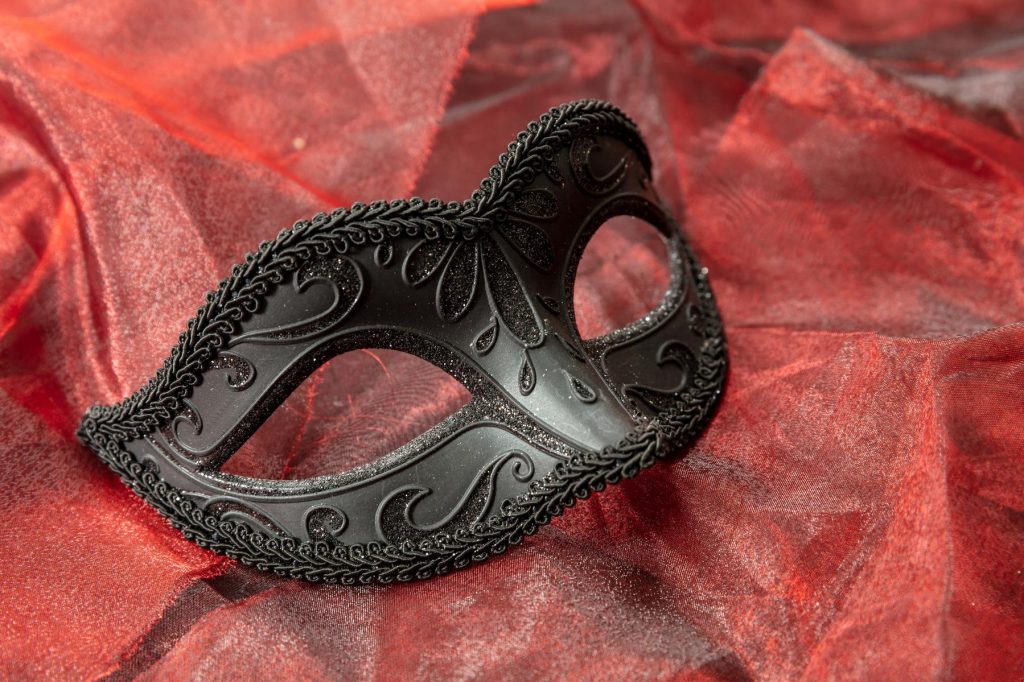 carnival-venetian-black-mask-on-red-color-fabric-b-2023-11-27-05-23-31-utc